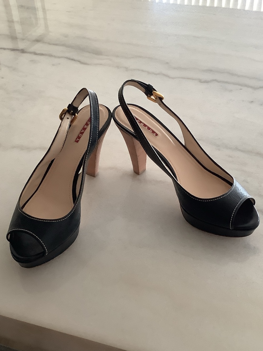 Prada Black Leather Peep-Toe Slingback Heels with Gold Buckle Accent